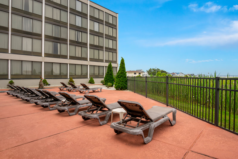 Sundeck located at the pool area and with bay view